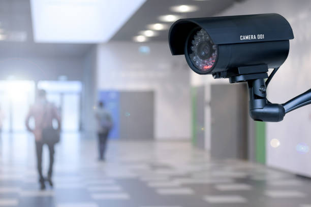 The concept of security through surveillance camera in the corporation or government building.
